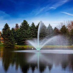 Scott 3HP Fountain with Skyward Pattern Operating in a Pond  with Trees at the Back 13230