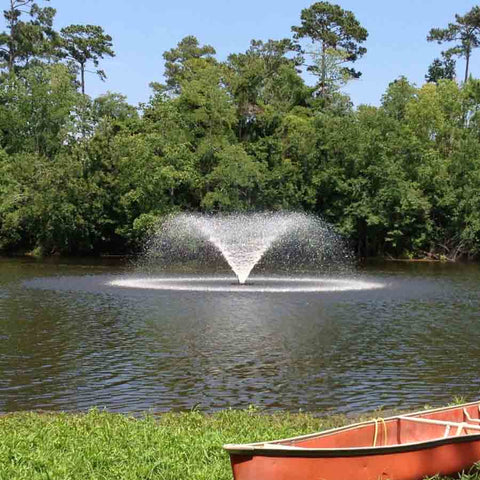 Kasco 1HP Aerating Fountain 4400VFX with V-Shape Pattern Operating in a Pond with Trees Behind 115V/230V