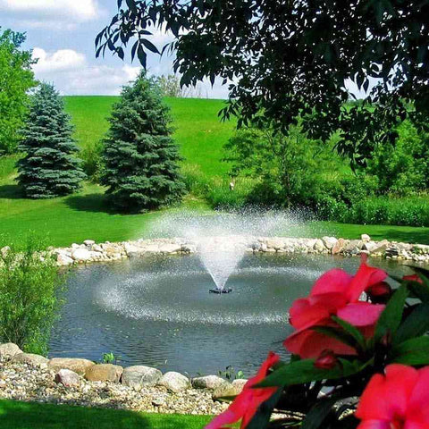 Kasco 1HP Aerating Fountain 4400VFX with V-Shape Pattern Operating in a Pond Surrounded by Plants  115V/230V